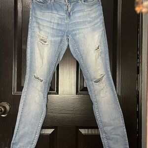 Women's Light Blue Distressed Jeans